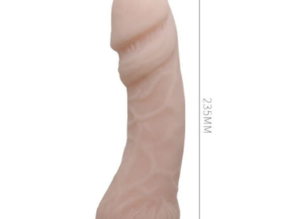 Ein pfirsichfarbener realistischer silikon dildo von baile mit strukturierter oberfläche und abgerundetem boden