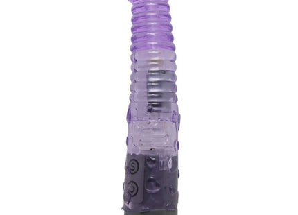 Lila transparenter silikonvibrator mit strukturierten rippen und dunkelgrauer basis aus der baile kollektion