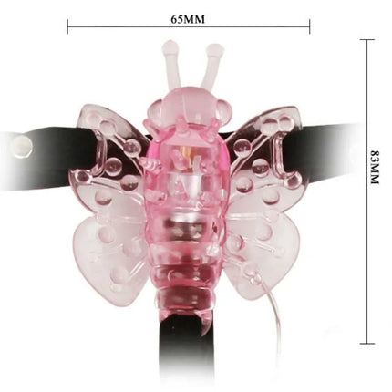 Baile gurt mit vibrierendem pink transparentem schmetterling aus kunststoff und schwarzem riemen mit klaren flügeln