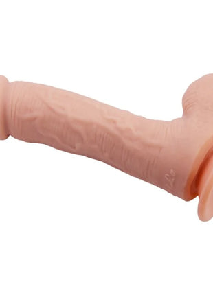 Peachfarbener silikon dildo mit strukturierter oberfläche und abgerundetem sockel baile johnson realistischer hautsildo 22 cm
