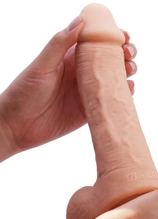 Baile johnson realistischer hautdildo 22 cm in pfirsichfarbe aus silikon mit detailierter struktur und logo am fuß