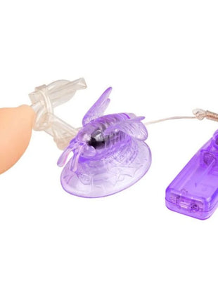 Lila klitorisstimulation vibrierender schmetterling adult toy aus durchsichtigem lila plastik mit beigeem ballon und fernbedienung