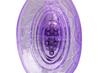 Lila vibrierender klitorisstimulator von baile mit ovaler transparenter form und texturierter oberfläche
