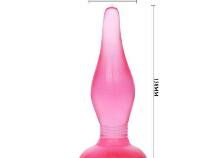 Ein durchscheinender rosa silikon analplug mit breiter basis und verjüngter spitze 14,2 cm lang von baile