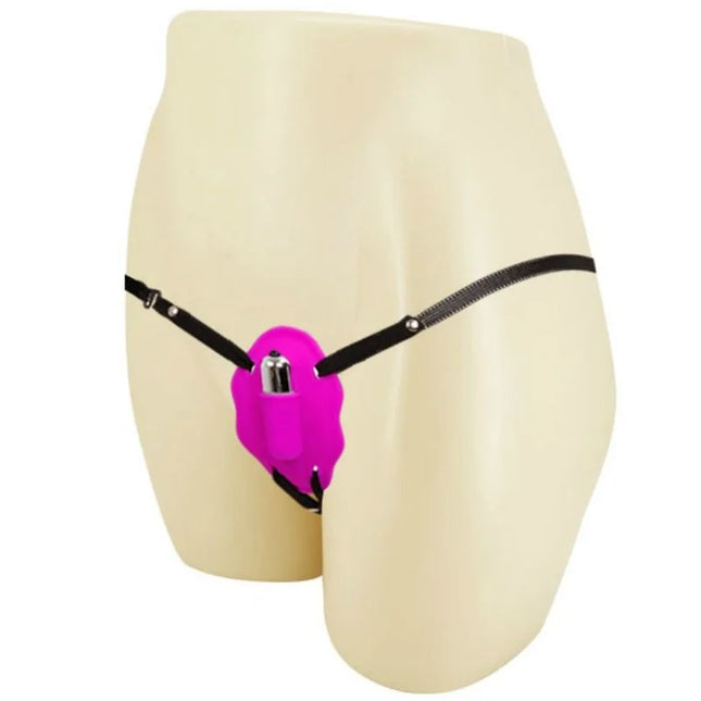 Vibrant pink silikon pelvic vibrator mit schwarzen riemen und silbernen metallakzenten von BAILE visible from front