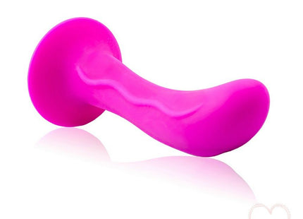 Vibranter pinker silikon analplug mit glattem, gebogenem design und abgerundetem sockel von baile passion starker saugstecker unisex