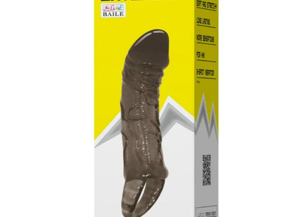 Dunkelbraunes, transparentes silikon penilverlängerungshülle mit gurt für hoden 11,5 cm in gelb-weißem karton