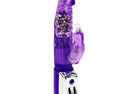 Lila transparenter plastik-kaninchenvibrator mit silberner steuerung am grund baile persischer elite kaninchen