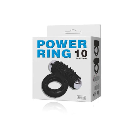 Schwarzer silikon power ring mit silbernen metallkugeln und geriffelter oberfläche verpackt in weißer box power ring 10 funktionen von baile