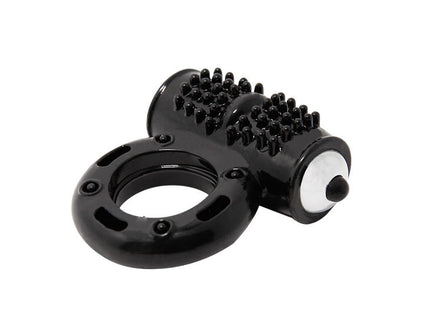 Schwarzer silikonring mit strukturierter bürstenkopf und weißem knopf seitlich baile power ring vibrator 10v