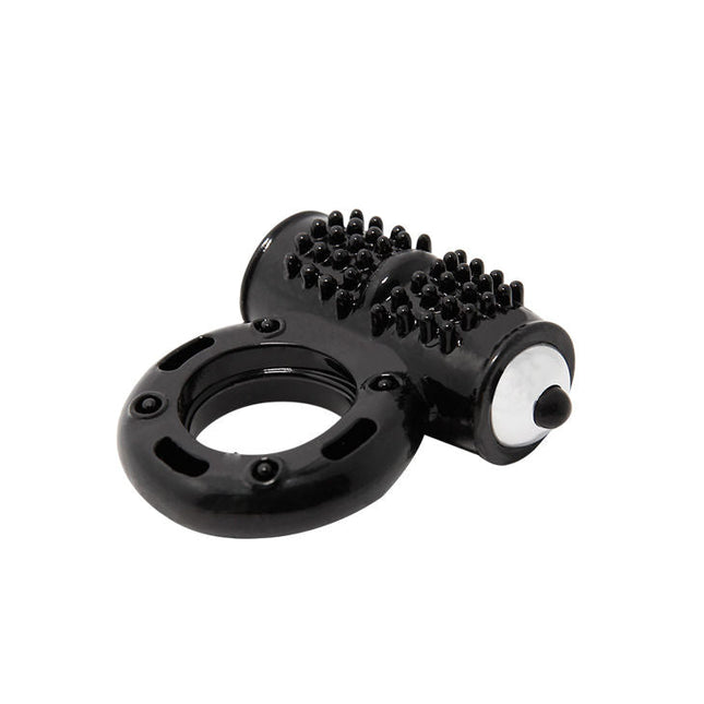 Schwarzer silikonring mit strukturierter bürstenkopf und weißem knopf seitlich baile power ring vibrator 10v