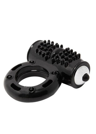 Schwarzer silikonring mit strukturierter bürstenkopf und weißem knopf seitlich baile power ring vibrator 10v