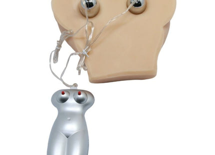 Silbernes metallic realistische vagina und anus device mit roten led-augen und zwei silbernen kugeln am beigefarbenen kopfmodell