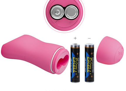 Pinkes silikonvibrationsgerät mit herzförmiger öffnung und abnehmbarem deckel neben zwei aaa batterien von baile