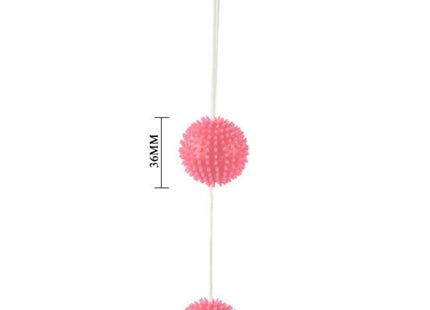 Rosa strukturierte massagekugel 3.6 cm mit texturierter oberfläche und weißer schnur von baile