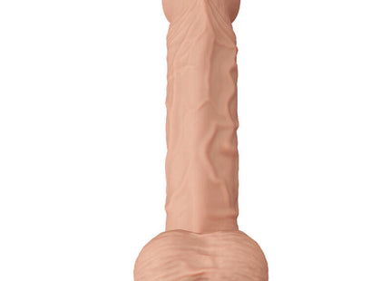Ein pfirsichfarbener realistischer silikon dildo von baile mit strukturierten rippen und abgerundetem sockel 26 cm
