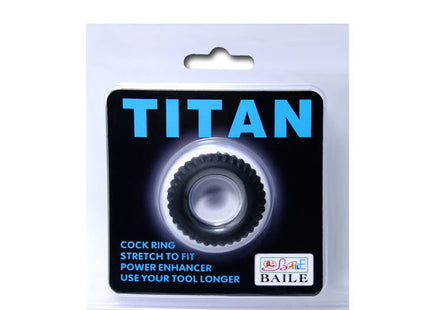 Schwarzer und silberner strukturierter cockring aus silikon in transparenter verpackung mit blauem titan branding