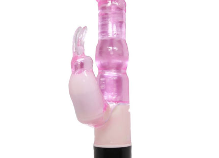 Pink transluzenter vibrationskaninchen mit schwarzer basis und lila knopfe von baile waves of pleasure fantasy 23 cm