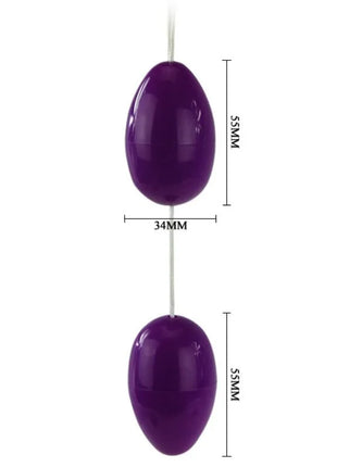 Lila glänzende ovale analvibratoren aus silikon von baile verbunden durch eine dünne weiße schnur
