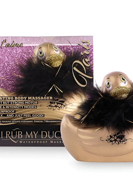 Goldfarbener federbesetzter duck-shaped vibrierender körpermassagegerät mit glänzendem finish und schwarzen dekorativen wirbeln von big tease toys