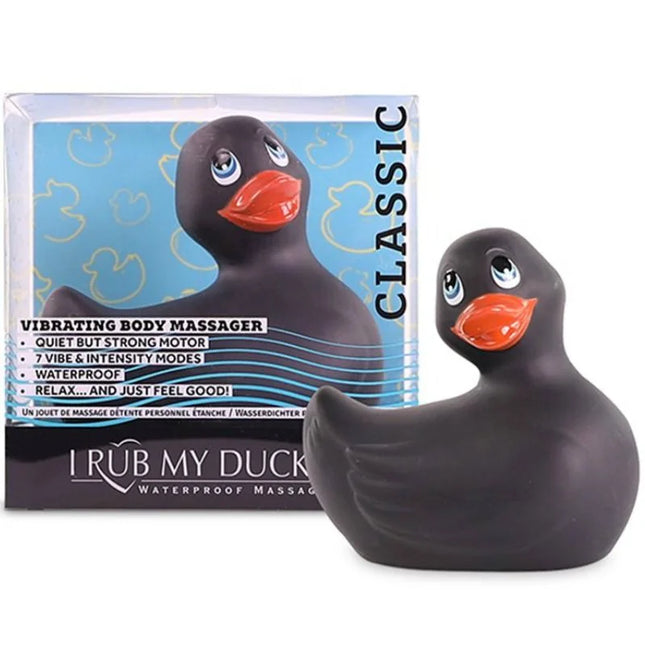 Schwarzer vibrierender badeente massager mit orangefarbenem schnabel und blauen augen von big tease toys
