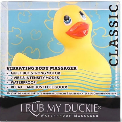 Gelber gummi-entenförmiger vibrierender körpermassagegerät mit rotem schnabel und blauen augen von i rub my duckie classic
