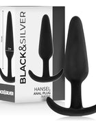 Schwarzer silikon-analsplug hansel mit kleinem griff und gebogenem hakenförmigem fuß für angenehme anwendung