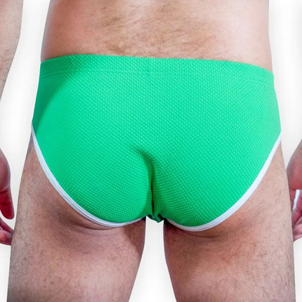 Helle grüne strukturierte badehose burn 022 green slip s mit weißem besatz für den badegebrauch