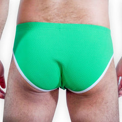 Hellegrüne strukturierte badehose burn 022 green slip s mit weißem besatz vorne sichtbar