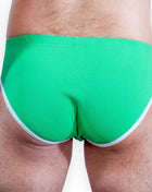 Hellegrüne strukturierte badehose burn 022 green slip s mit weißem besatz vorne sichtbar