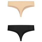 A pair of bye-bra seamless thong underwear in nude and black made of smooth stretchy fabric ideal para ropa ajustada