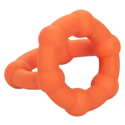 Orange silikon beißring mit segmentiertem ineinandergreifendem design von calexotics alpha all star ring