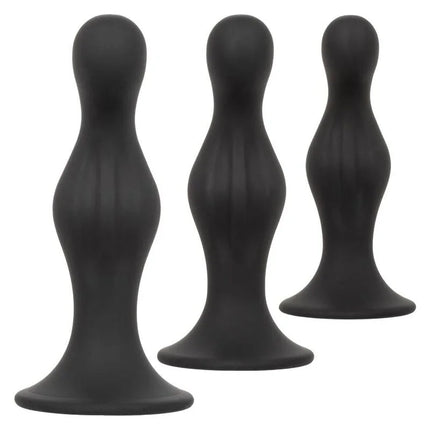 Set aus drei schwarzen silikon anal plug mit glattem, konischem design von calexotics anal ripple kit