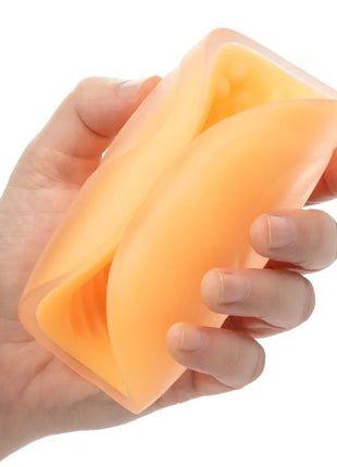 Orange silikonhülle für das beaded grip masturbator von calexotics mit flexiblem, faltbarem design
