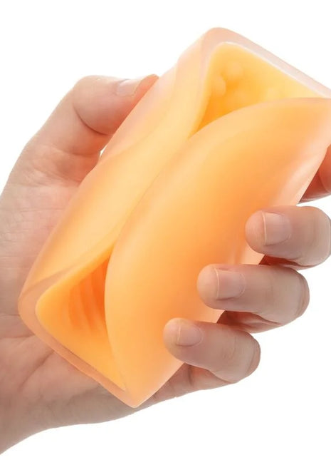 Orange silikonhülle für das beaded grip masturbator von calexotics mit flexiblem, faltbarem design