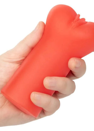 Ein leuchtend rotes herzförmiges stressabbauspielzeug aus glattem silikon von calexotics billiger begeistert die teufel