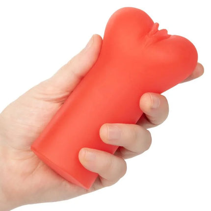 Ein leuchtend rotes herzförmiges stressabbauspielzeug aus glattem silikon von calexotics billiger begeistert die teufel
