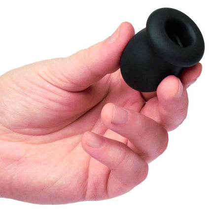 Schwarzer silikon analplug mit abgerundetem, kegelförmigem design und glatter oberfläche von calexotics boundless ftm stroker reversible 5cm