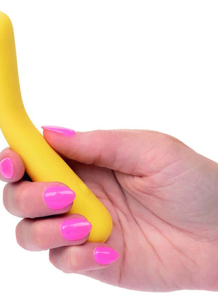 Gelbes silikon-vibrationsspielzeug mit glattem, gebogenem design von calexotics boundless mini-flexiwand