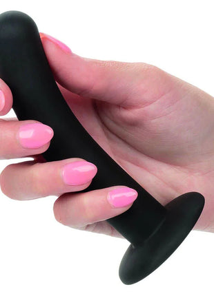 Schwarzer silikon-analplug mit abgerundetem kopf und ausgestellter basis aus dem calexotics boundless silikon-kurve pegging kit