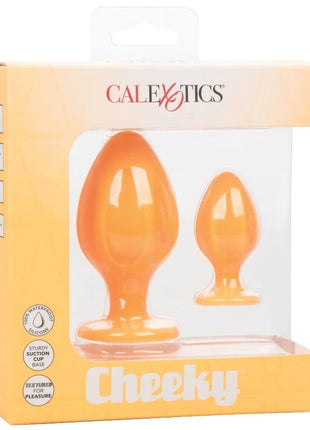 Orangene silikon anal plugs in einer calexotics cheeky verpackung für den analgebrauch