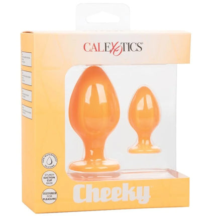 Orangene silikon anal plugs in einer calexotics cheeky verpackung für den analgebrauch