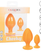 Orangene silikon-cheeky-analplugs im zweiteiligen set von CalExotics für angenehmen Gebrauch