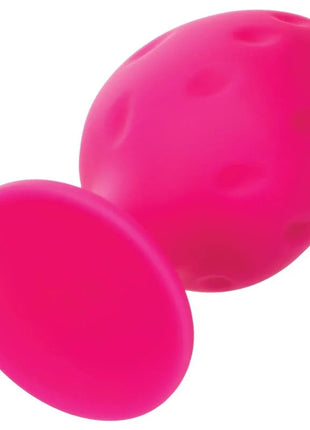 Calexotics cheeky buttplug rosa hellrosa silikon in eiförmiger form mit glatter oberfläche und kleinen runden eindellungen