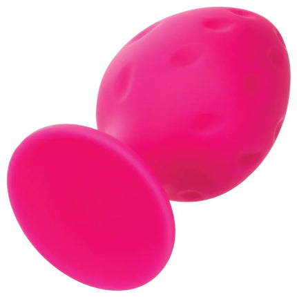 Calexotics cheeky buttplug rosa hellrosa silikon in eiförmiger form mit glatter oberfläche und kleinen runden eindellungen