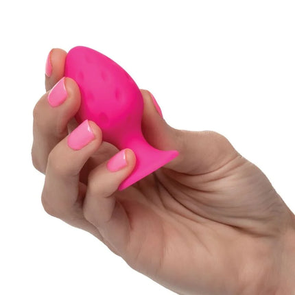 CaleXotics cheeky buttplug rosa ein lebhafter rosa silikon vaginaldilator mit strukturierter rundlicher spitze und breiter basis