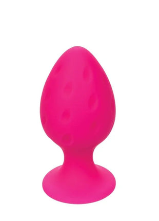 Vibrant pink silikon butt plug mit strukturierter punktoberfläche und saugbasis von calexotics rosa
