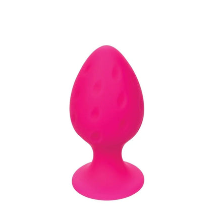 Vibrant pink silikon butt plug mit strukturierter punktoberfläche und saugbasis von calexotics rosa