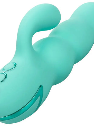 Tealgrüner silikon vibrator von calexotics mit glatter oberfläche drei rundtasten und tierkopfform im del mar diva design
