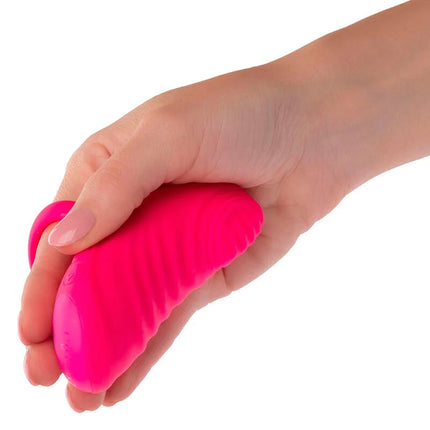 Vibranter rosa silikon stressball mit geriffelter oberfläche calexotics envy handmassager mit rollball und 7 vibrationen